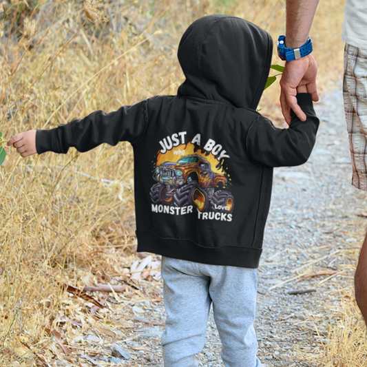 Boy wearing black zip hoodie with “Just a Boy Who Loves Monster Trucks” back print.
