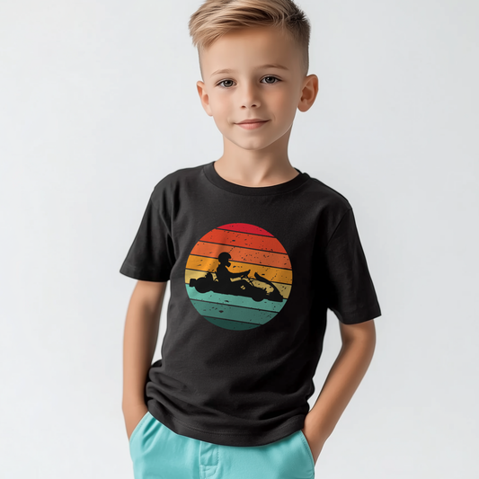 Boy wearing black retro sunset go-karting t-shirt with kart silhouette graphic