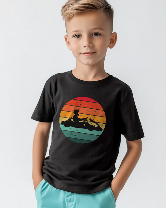 Boy wearing black retro sunset go-karting t-shirt with kart silhouette graphic
