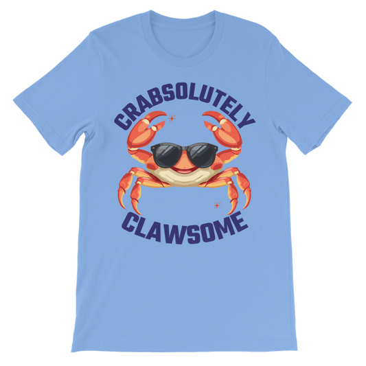 A kids light blue short-sleeve crewneck t-shirt featuring a graphic of a smiling orange crab wearing black sunglasses, with the words 'CRABSOLUTELY CLAWSOME' printed in dark blue around it.