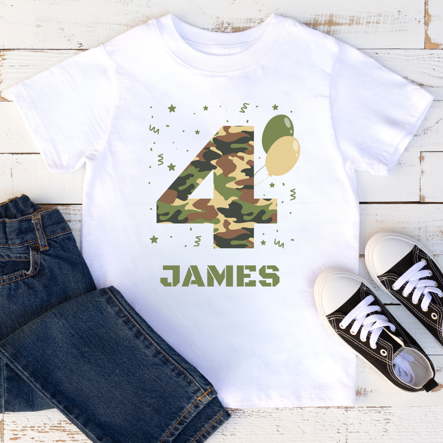 Personalised kids camouflage 4th birthday t-shirt flat lay with custom name James