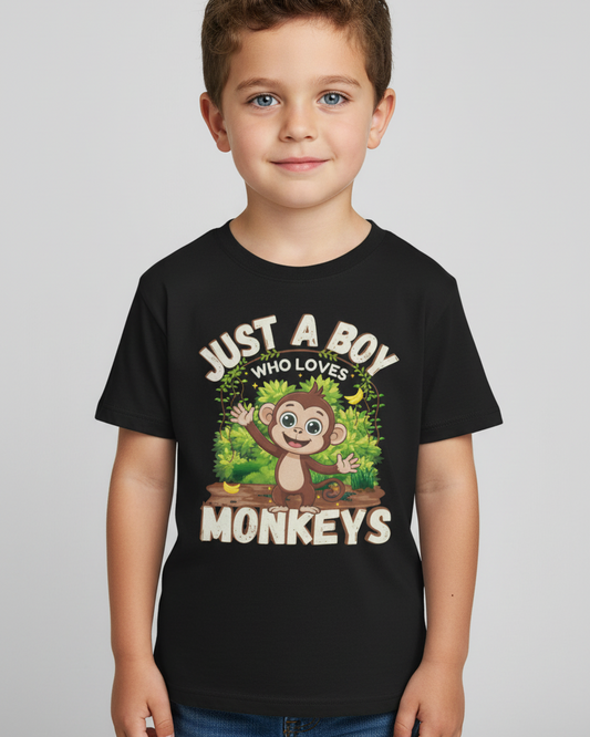 Cute kids monkey t-shirt with jungle monkey graphic worn by young boy in black tee