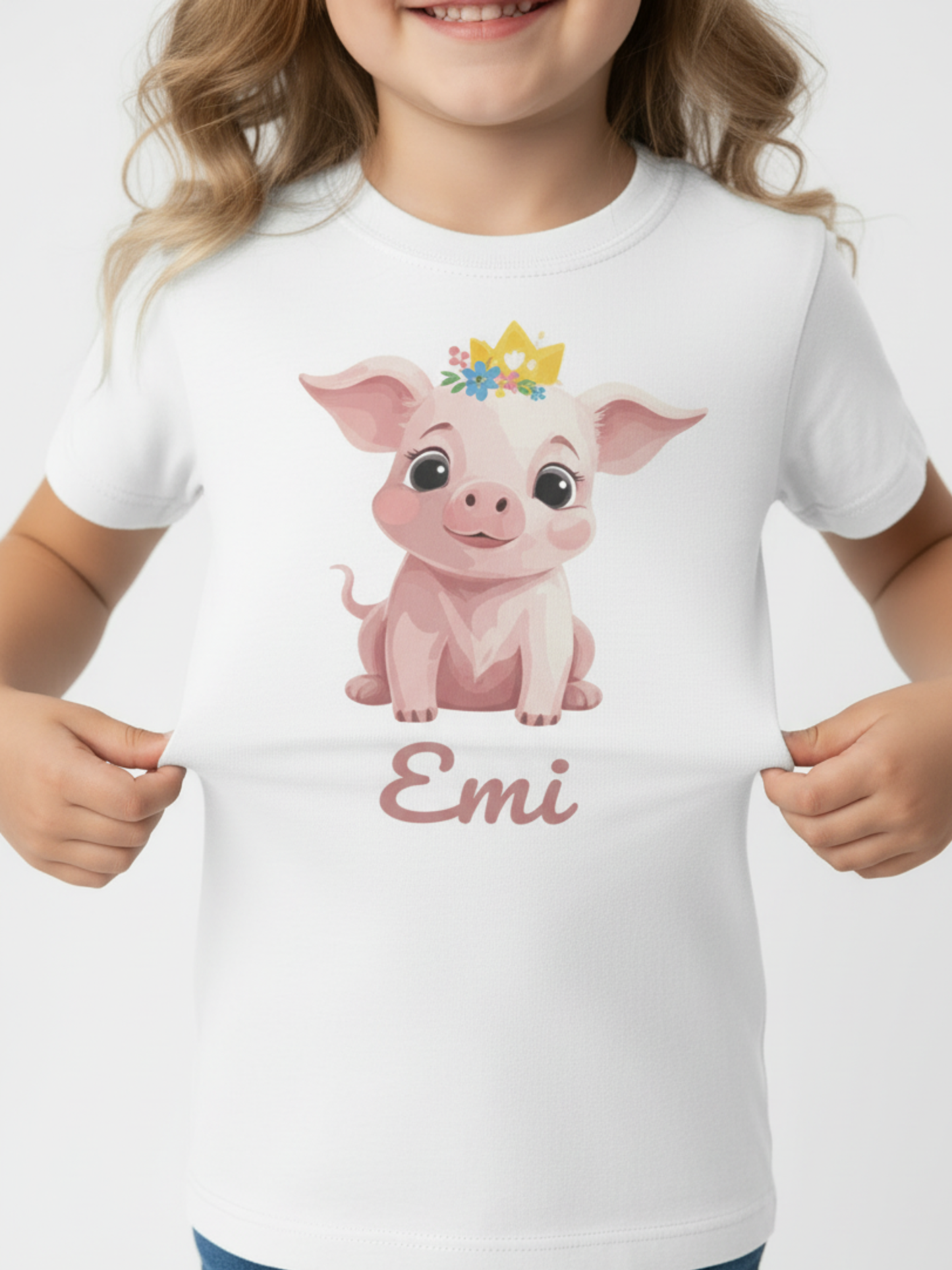 Close up of personalised princess pig design with crown and custom name on white girls t-shirt