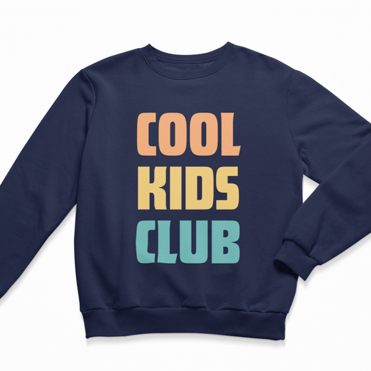 A navy blue crewneck sweatshirt featuring the text 'COOL KIDS CLUB' printed on the front in a retro stacked font with peach, yellow, and teal colors, shown against a plain white background.