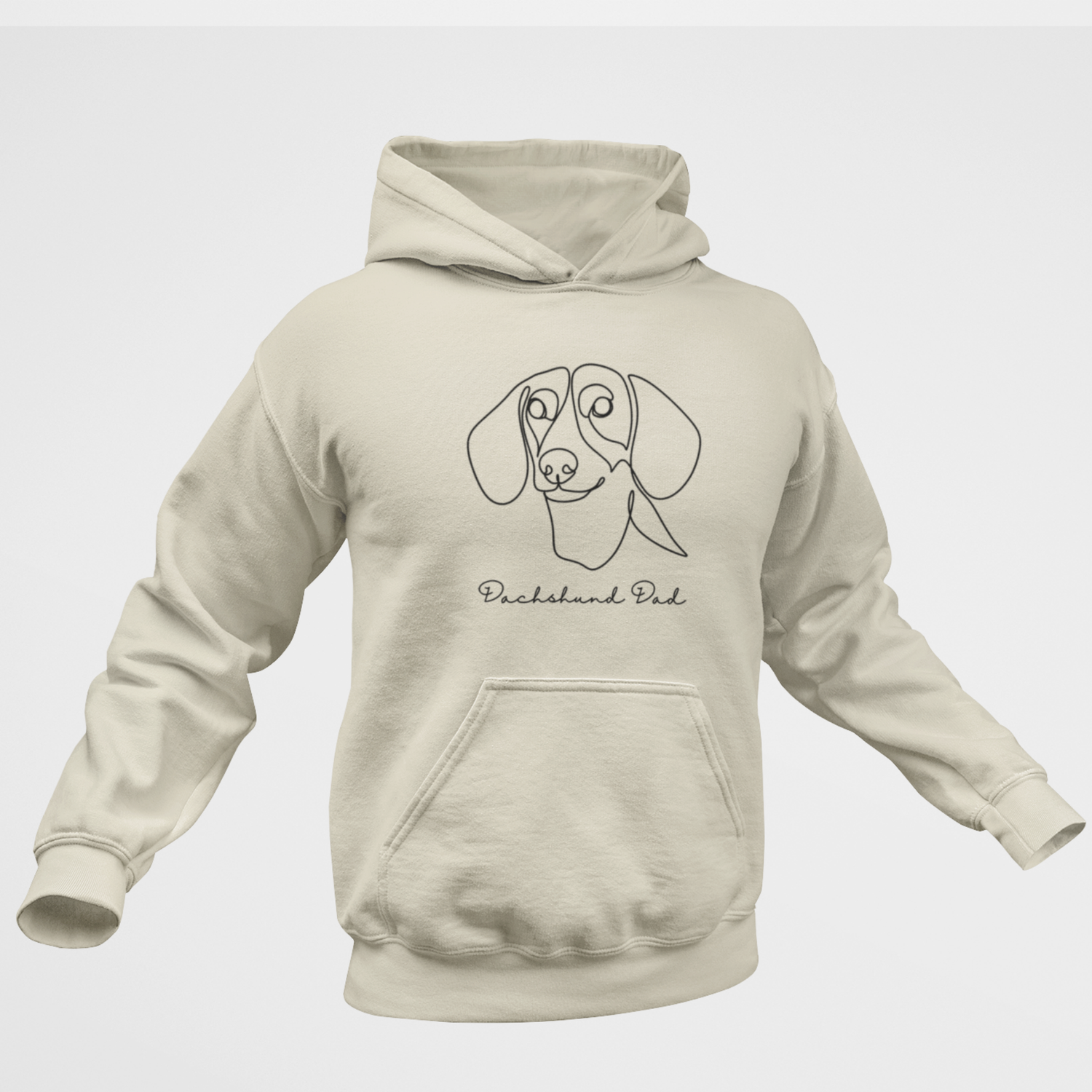 Adult unisex hoodie in milkshake colour featuring minimalist line art dachshund illustration with “Dachshund Dad” text.