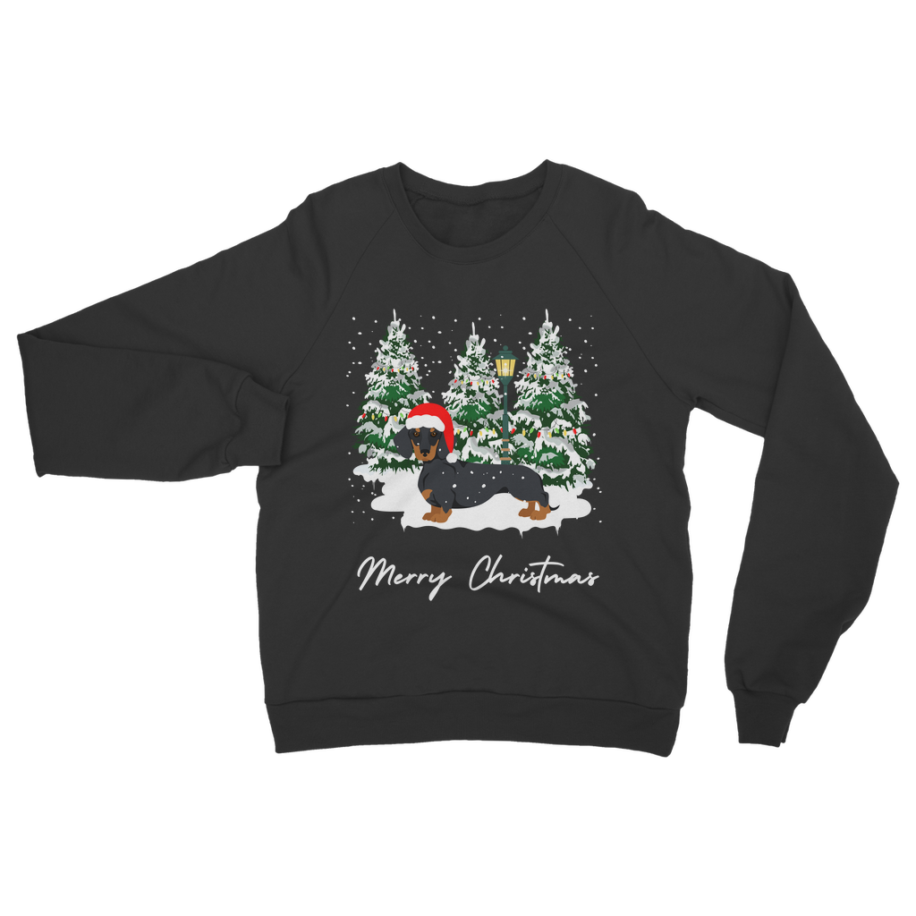 Adults black Christmas sweatshirt featuring a festive dachshund in a Santa hat, standing in front of snowy Christmas trees with a lamp post.