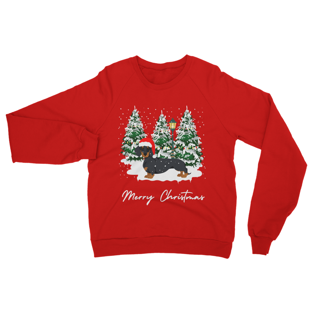Adults red Christmas sweatshirt featuring a festive dachshund in a Santa hat, standing in front of snowy Christmas trees with a lamp post.
