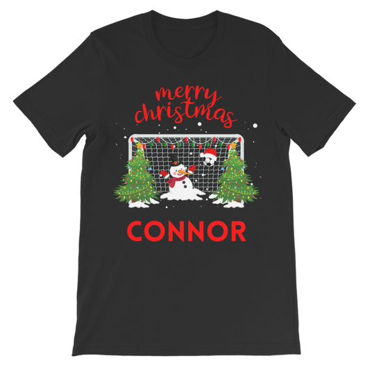 Flat lay kids Christmas T-shirt in black featuring snowman football goalie design and personalisation