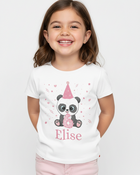 Girl wearing personalised panda birthday t-shirt with name Elise and number 6, white kids birthday shirt, studio portrait