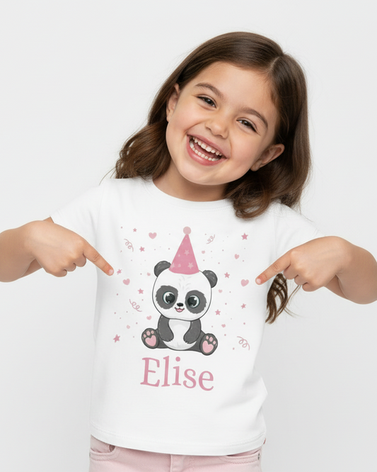 Girl pointing to personalised panda birthday t-shirt with name Elise and number 6, custom kids birthday shirt