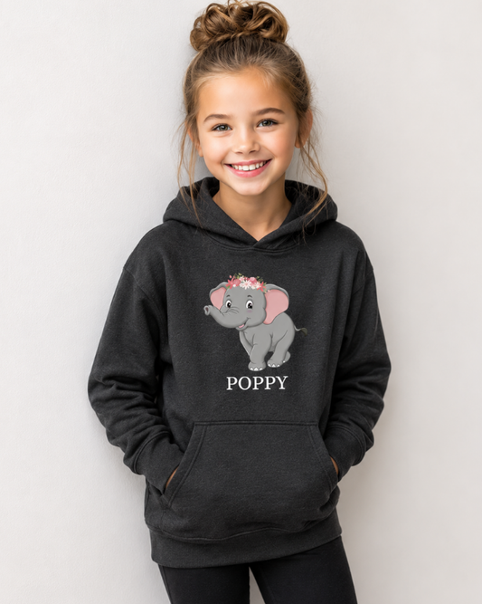 Young girl wearing personalised dark grey floral elephant hoodie with custom name Poppy printed underneath