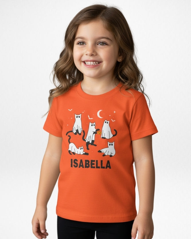 Girl wearing personalised Halloween ghost cat t-shirt with name Isabella orange kids spooky tee