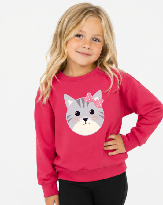 Girl wearing hot pink cat sweatshirt, cute kitten face with bow, kids casual outfit studio portrait