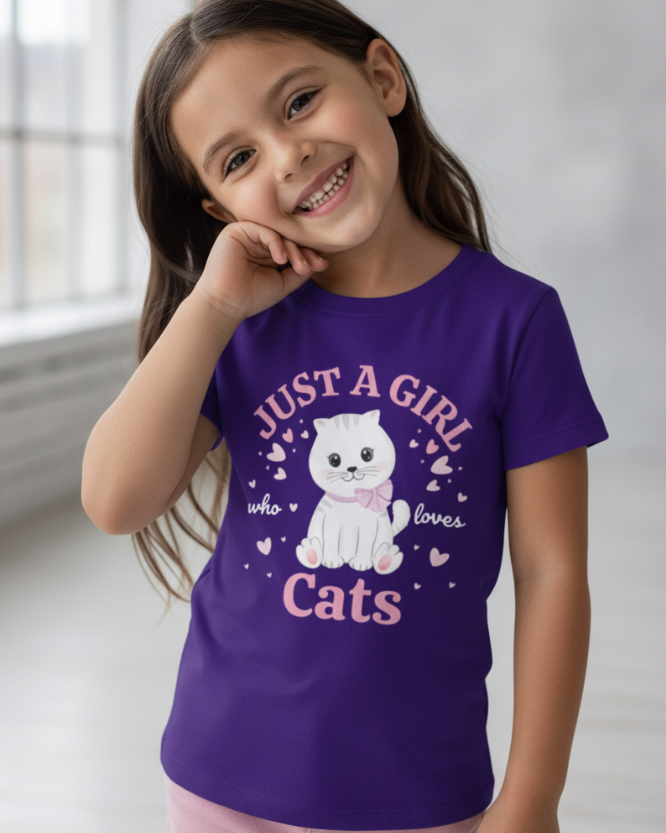 Smiling girl wearing purple cat lover T-shirt for kids featuring “Just a Girl Who Loves Cats” slogan and kitten illustration.