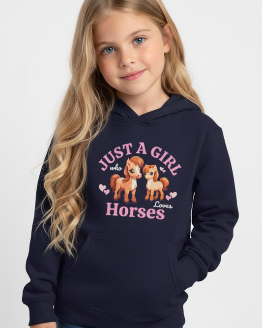 Girl modelling navy kids hoodie with “Just A Girl Who Loves Horses” print, horse lover girls pullover hoodie studio photo