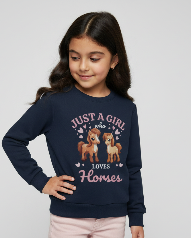 Girl wearing a navy blue sweatshirt with horse design and text on a light gray background