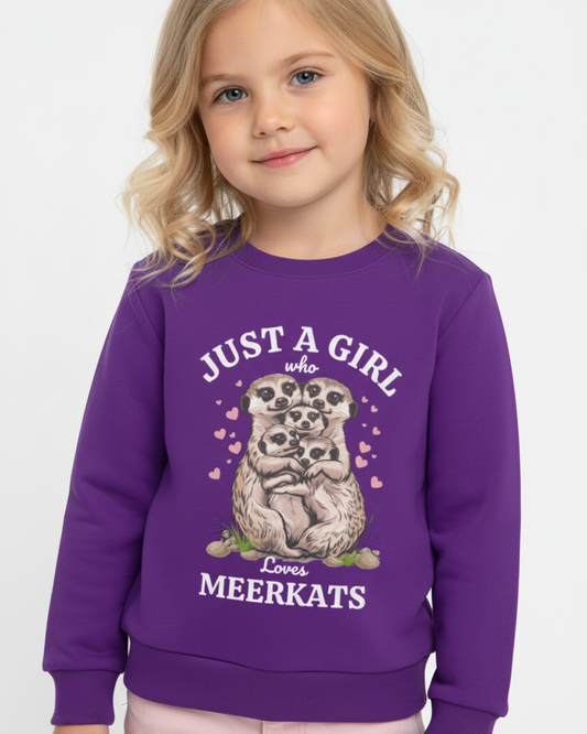Girl wearing purple sweatshirt with “Just a Girl Who Loves Meerkats” design – cute kids animal jumper outfit