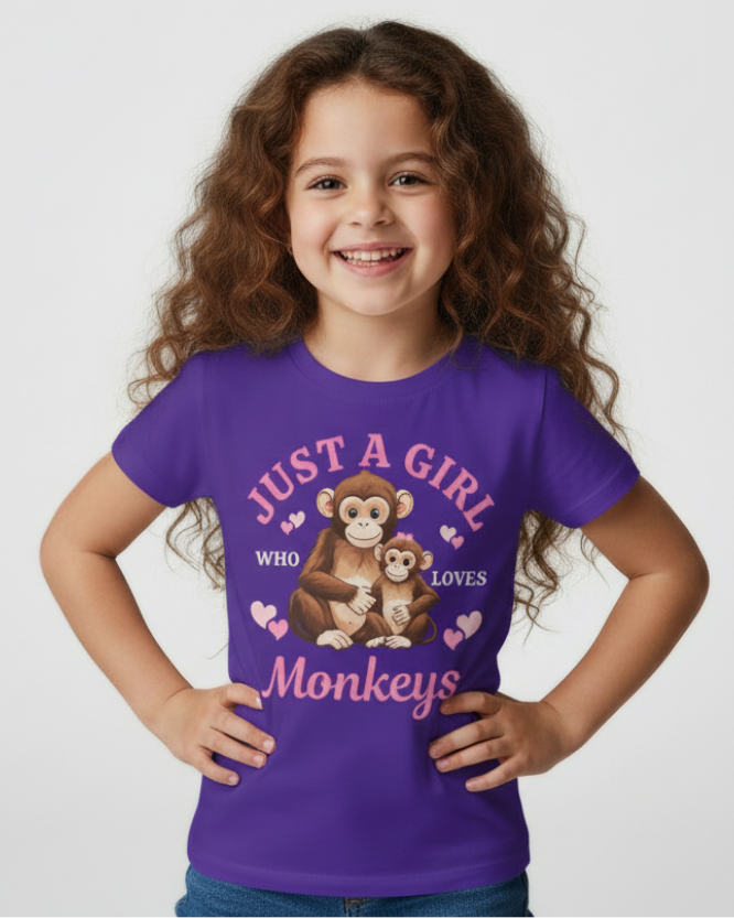 Girl modelling purple "Just a Girl Who Loves Monkeys" graphic t-shirt with cartoon monkeys, studio portrait, kids cute animal shirt.