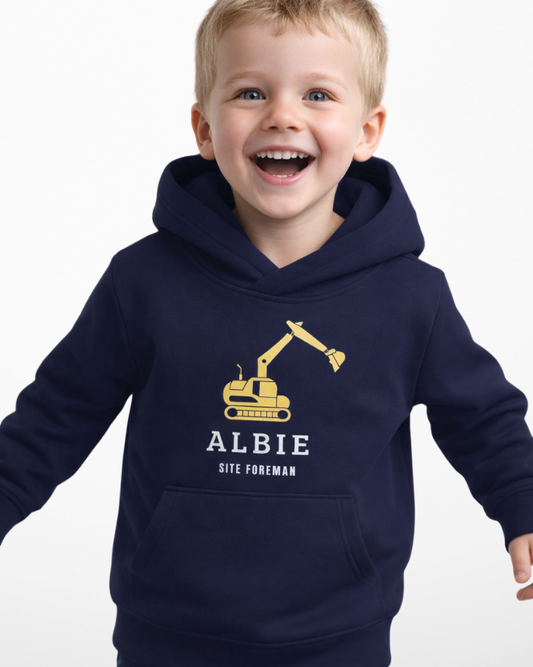 Front view of kids navy personalised excavator hoodie with custom name and “Site Foreman” print, studio background.