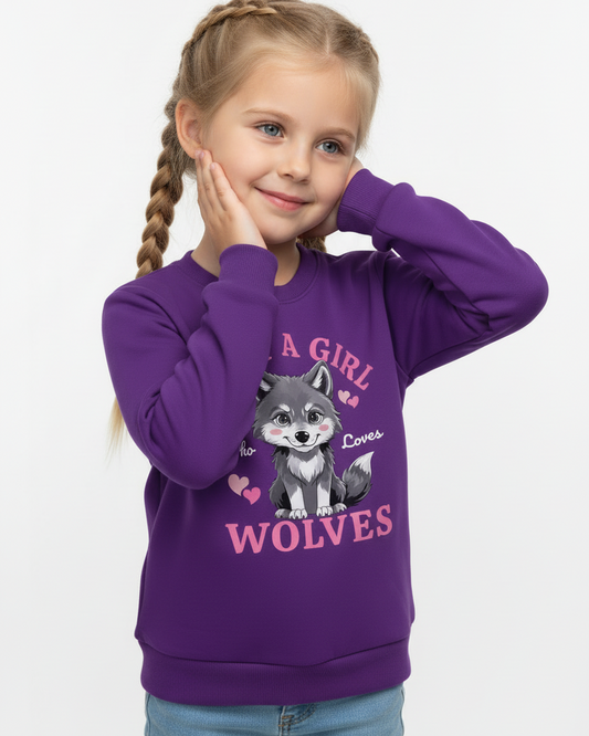 Young girl in purple wolf sweatshirt with cute animal graphic – girls cosy jumper outfit with wolves design