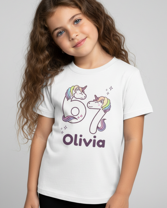 Child modelling personalised Six Seven unicorn number t-shirt with custom name Olivia
