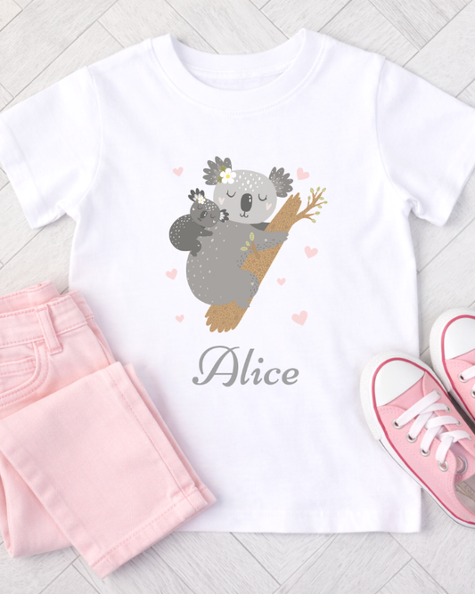 Girls personalised koala white T-shirt flat lay with pink jeans and pink trainers outfit
