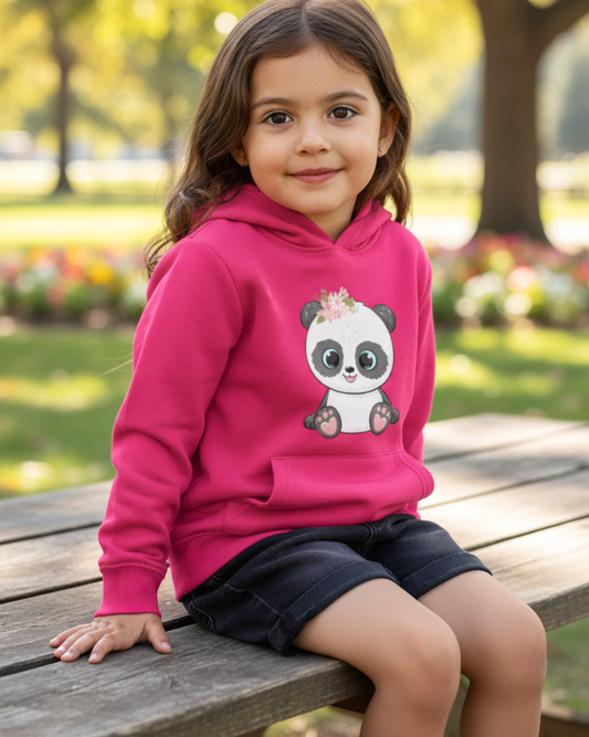 Girl wearing hot pink hoodie with cute floral panda design sitting outdoors, kids animal hoodie