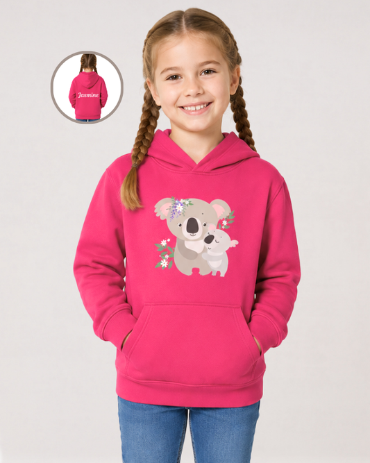 Girl wearing hot pink personalised koala hoodie with front design and back name detail