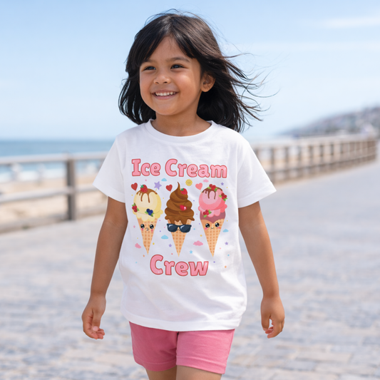 “Smiling 6 year old girl wearing an Ice Cream Crew t-shirt walking along a sunny seaside promenade.”
