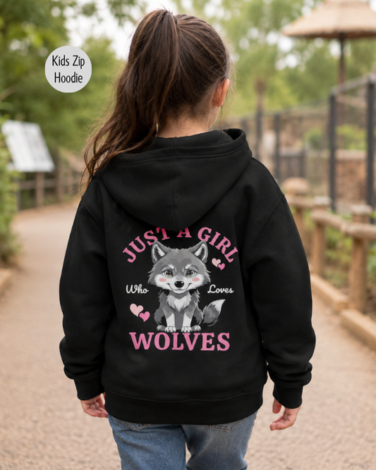 Girl wearing a black “Just a Girl Who Loves Wolves” back print zip hoodie, walking through a wildlife park.