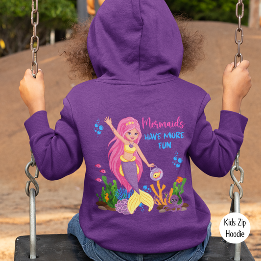 Child wearing a purple zip hoodie with a mermaid design printed on the back of the hoodie