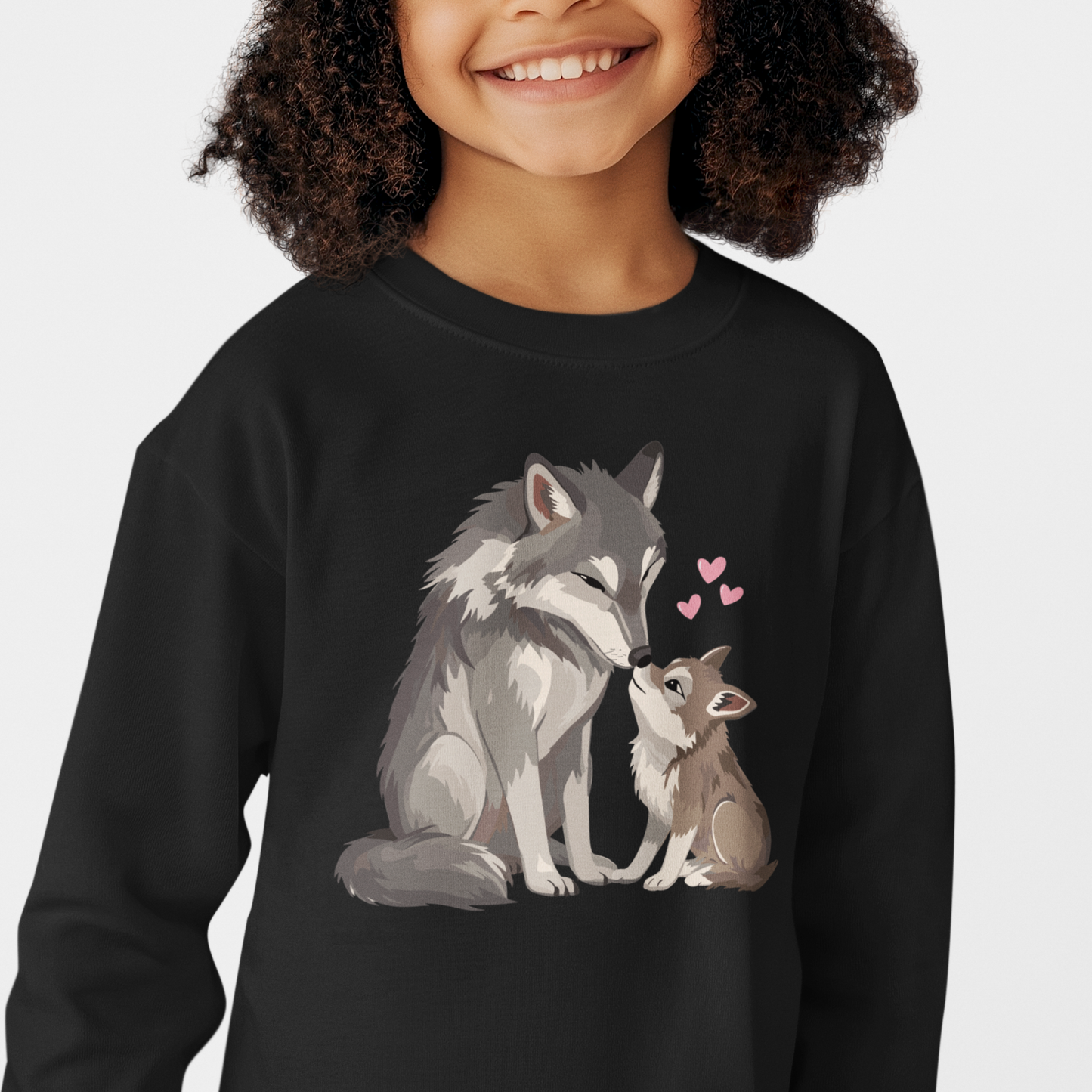 Child wearing a black sweatshirt with a wolf and wolf cub design on a white background.