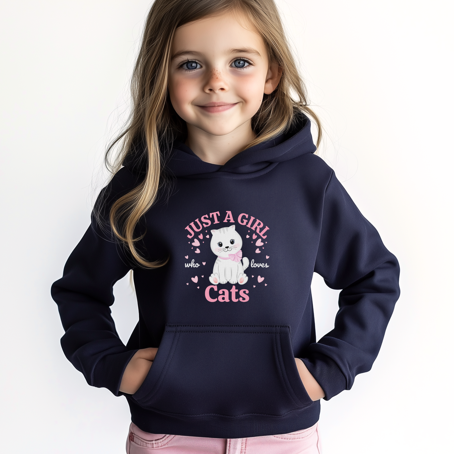 Young girl wearing a navy hoodie with a cat-themed design on a white background