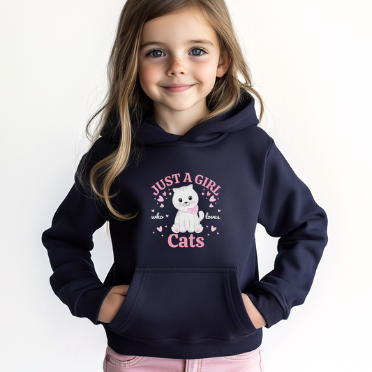 Young girl wearing a navy hoodie with a cat-themed design on a white background