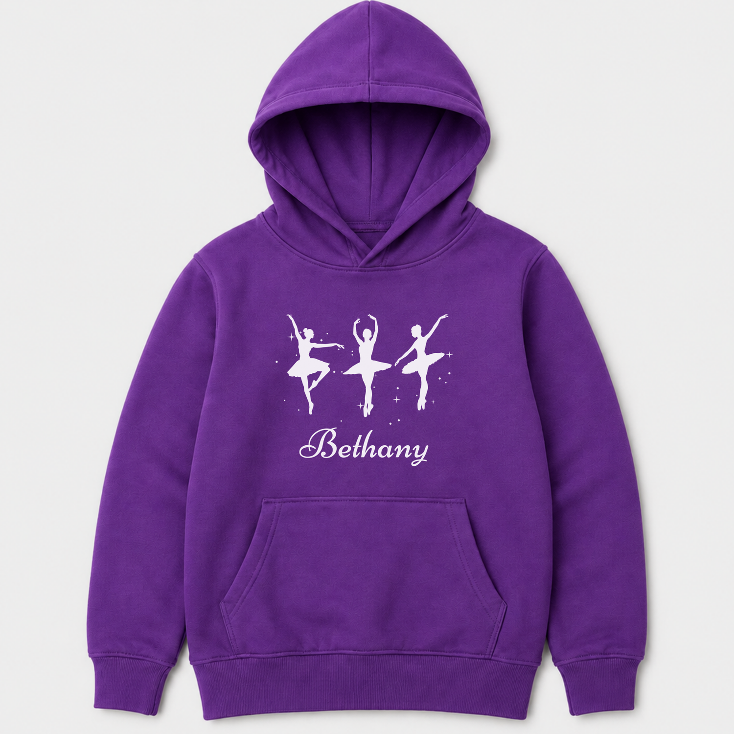 Kids purple pullover hoodie featuring three elegant ballerina silhouettes printed on the front, with a custom-name underneath