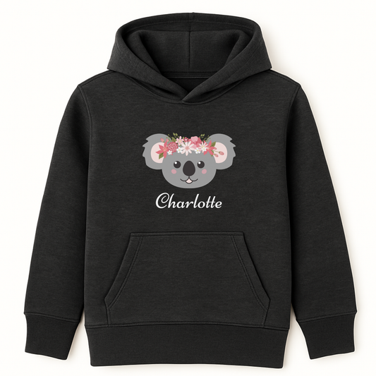 Charcoal heather grey girls personalised hoodie featuring a cute koala face wearing a floral crown with pink and white flowers, customised with the name.