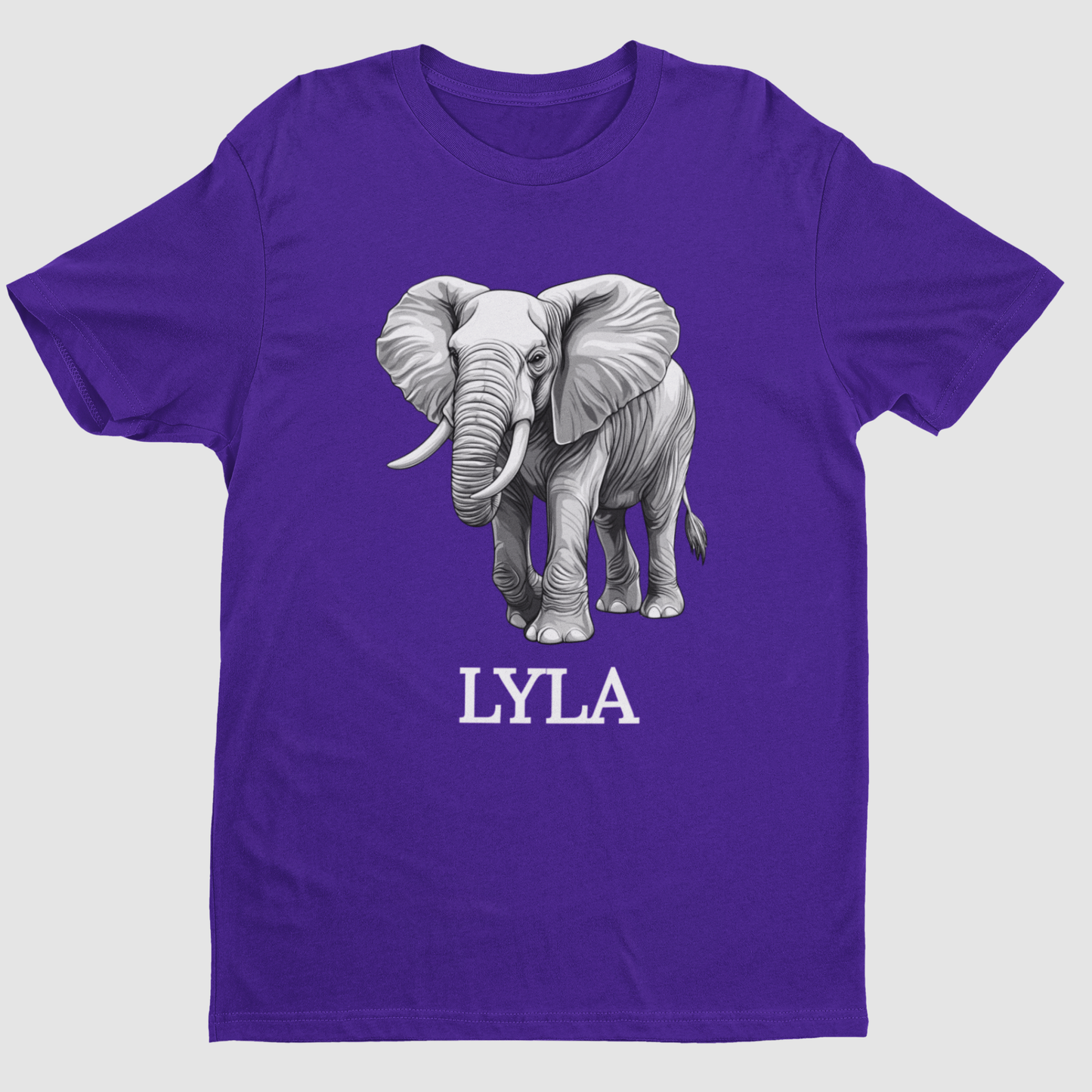 Kids purple short sleeve t-shirt with a graphic of an elephant and the name 'Lyla' printed underneath - flat-lay product