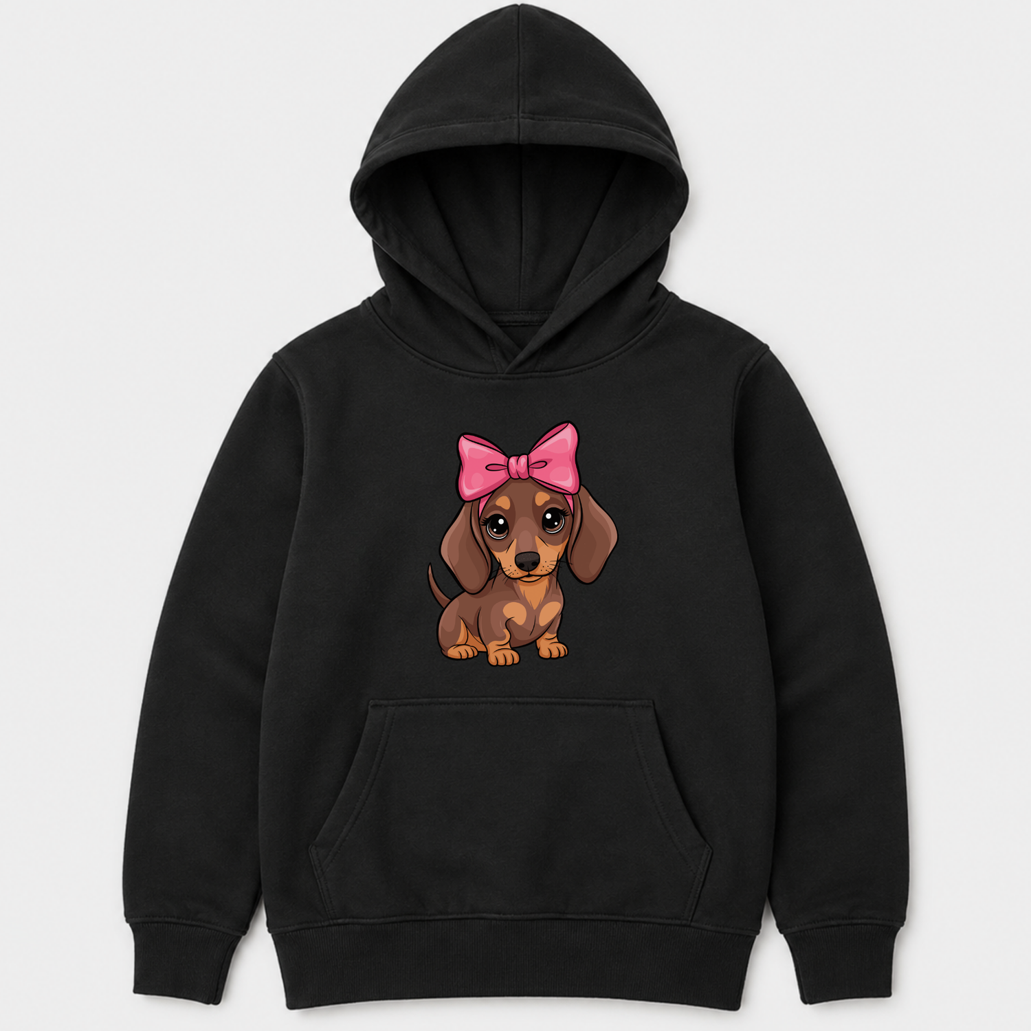 A kids black pullover hoodie featuring a cartoon graphic of a brown dachshund wearing a pink bow on the chest, displayed against a light grey background.