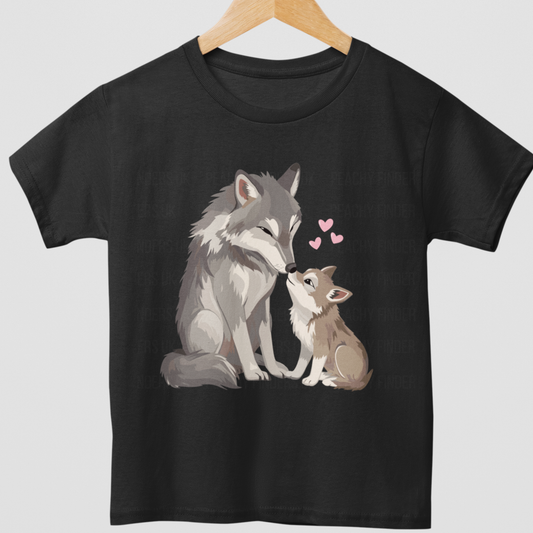 Girls black t-shirt with a cute wolf and pup illustration and pink hearts - styled on a wooden hanger.