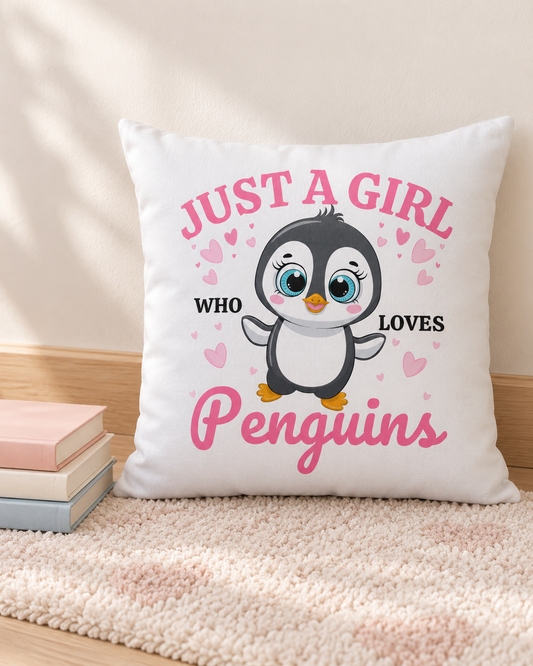 Just a Girl Who Loves Penguins cushion displayed on a cream rug beside pastel books