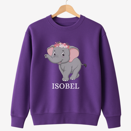 Purple sweatshirt with a cartoon elephant and 'ISOBEL' text on a white background