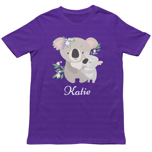 girls purple t-shirt featuring a cute mum and baby koala graphic.