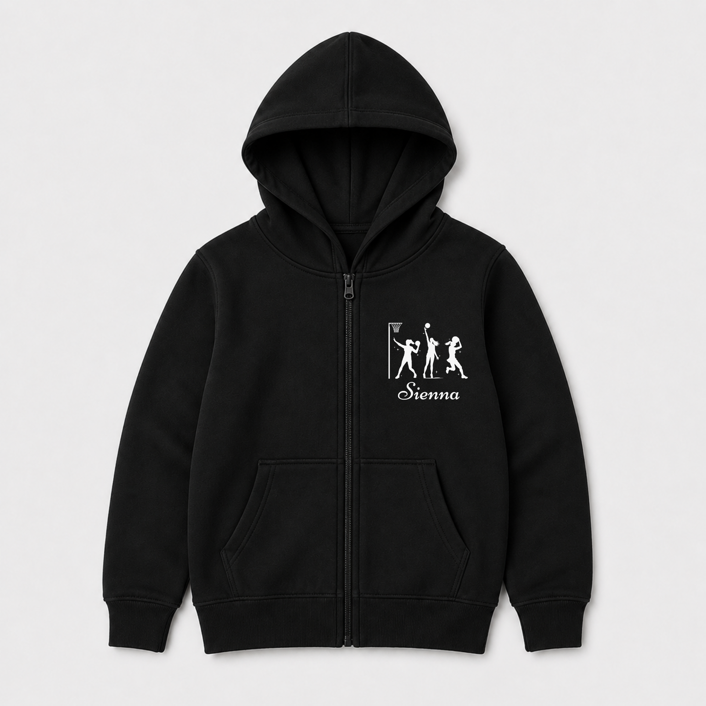 Girls’  black zip hoodie with white netball player artwork and the personalised name “Megan” on the chest.