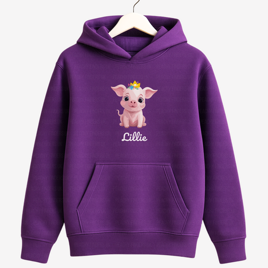 Purple hoodie with a cartoon pig and 'Lillie' text on a white background