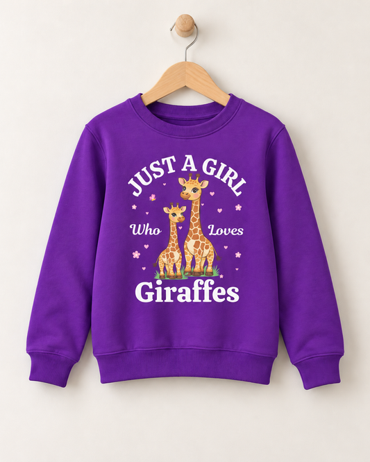 Purple kids crewneck sweatshirt hanging on a wooden hanger, featuring an illustration of two giraffes with hearts, flowers, and the text "Just a Girl Who Loves Giraffes."