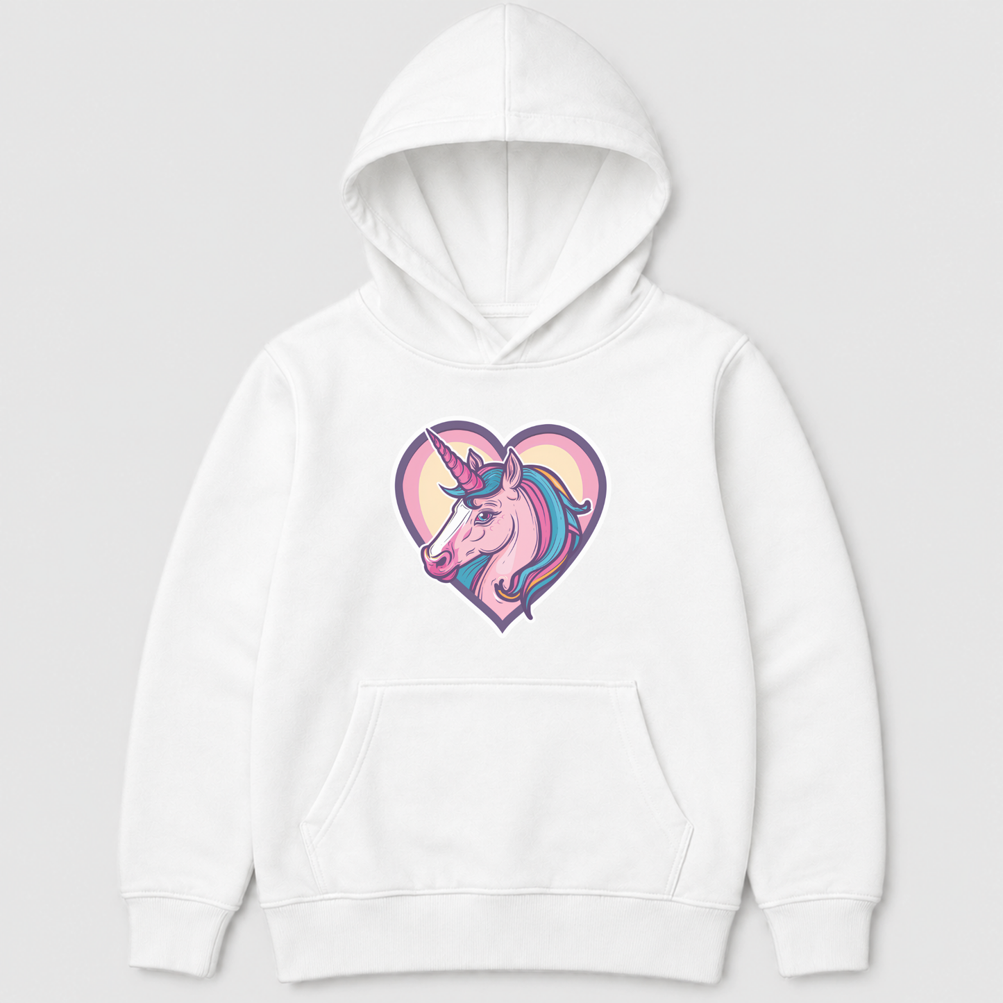 A girls white pullover hoodie featuring a colourful graphic of a unicorn inside a heart on the chest, displayed against a light grey background.