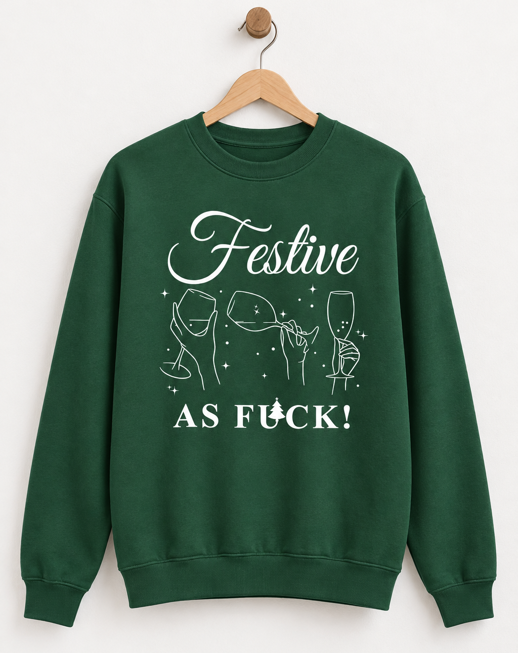 A dark green crewneck sweatshirt with a white graphic print on the front that reads 'Festive AS FUCK!' with line drawings of wine and champagne glasses and stars.