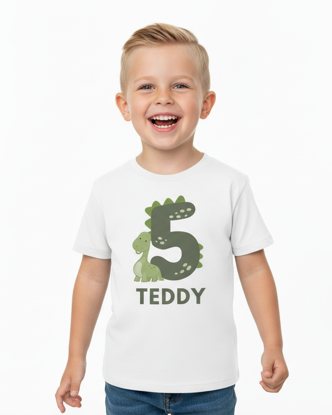 Happy boy wearing personalised 5th birthday dinosaur t-shirt with name Teddy, modern minimal birthday outfit for boys