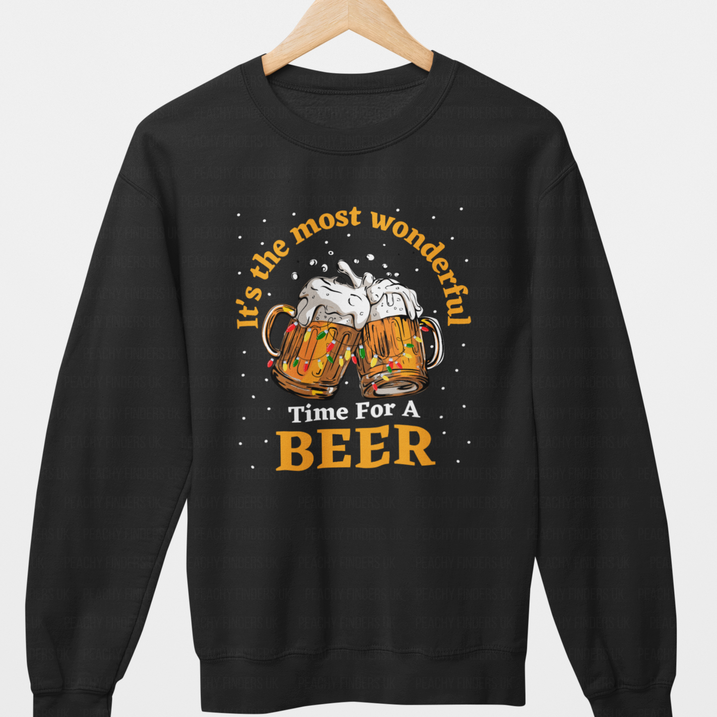 Adults Christmas sweatshirt with two clinking beer mugs, Christmas lights, snow, and the phrase "It’s the most wonderful time for a beer."