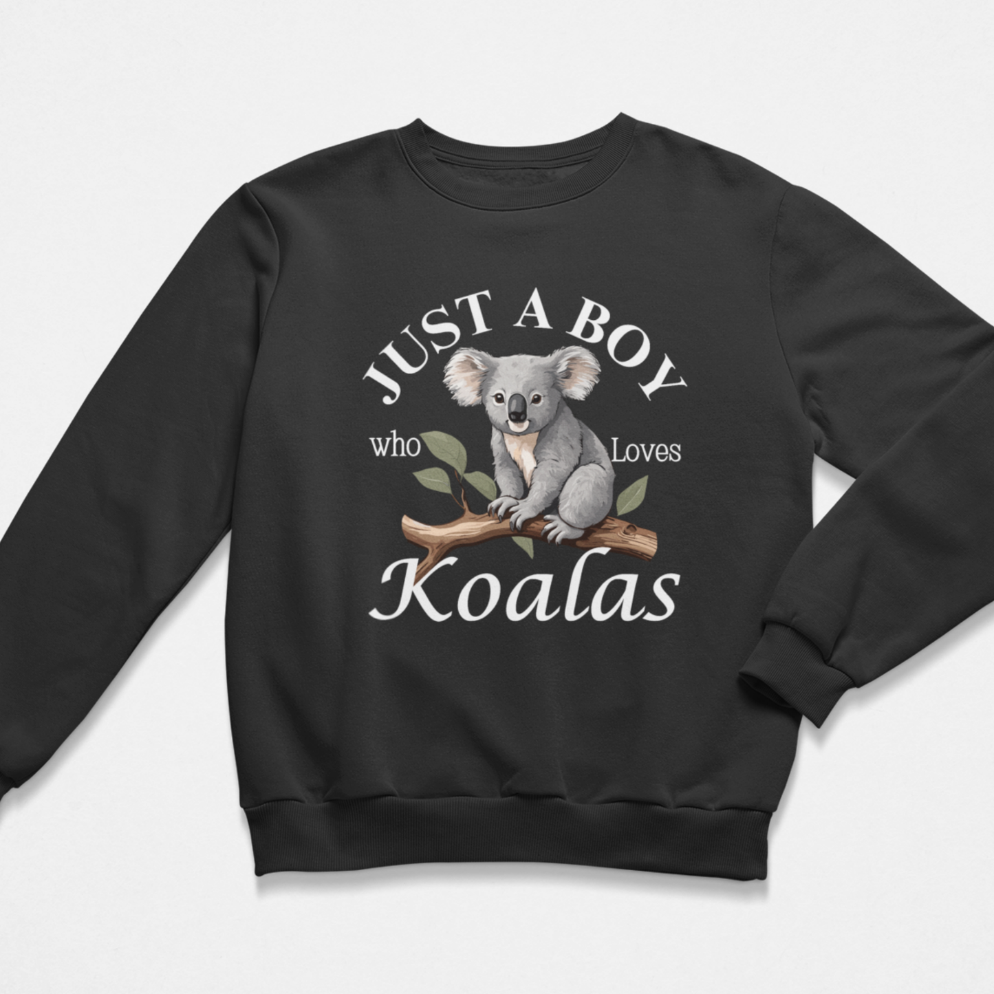 Boys black sweatshirt featuring a printed design of a cute koala sitting on a brown tree branch with green leaves, surrounded by the words “Just A Boy Who Loves Koalas” in white text.